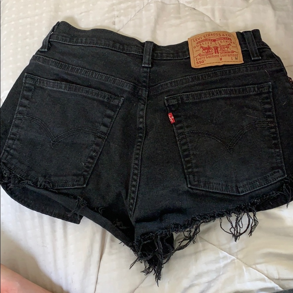 Black high waisted Levi’s 550